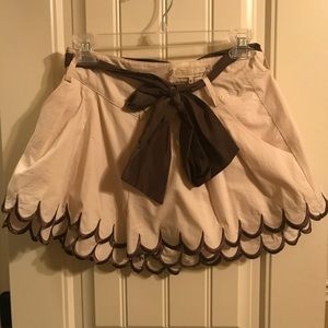 Ruffled shorts with brown sash