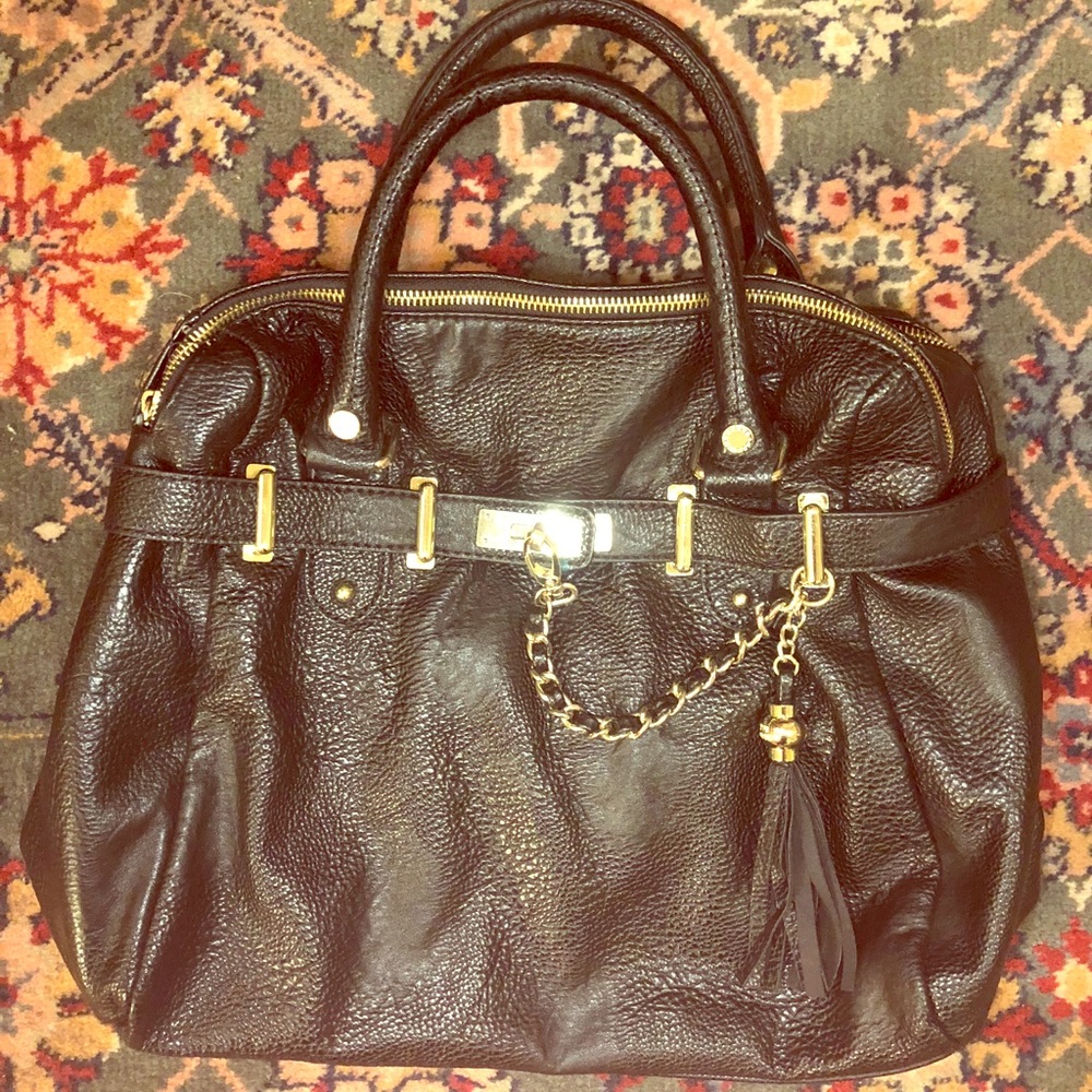 Steve Madden black leather and gold purse.