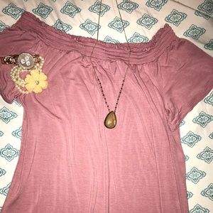 Off the shoulder dress.