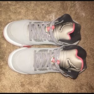 Pink and Gray Air Jordan basketball shoes