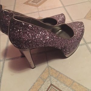 Glittery dark silver high heels.