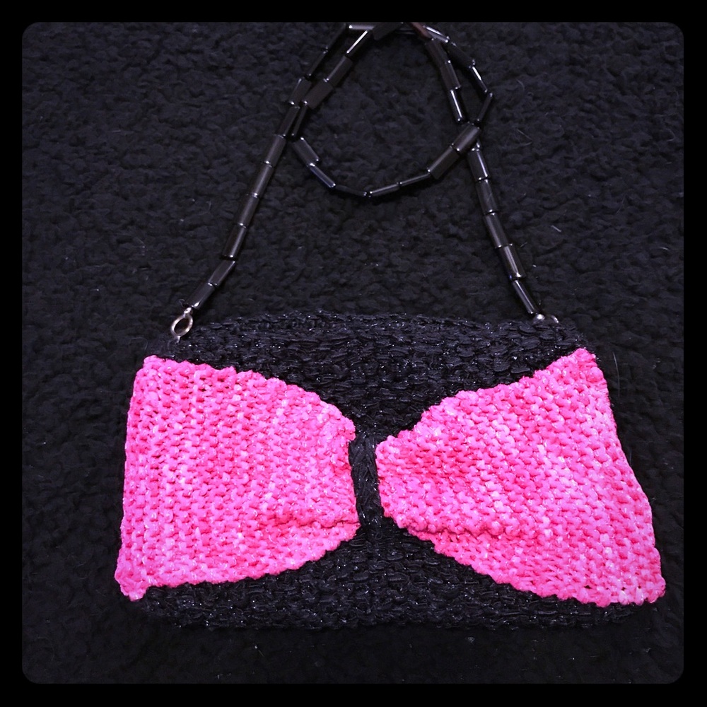 Brand new knitted purse pink and black bow