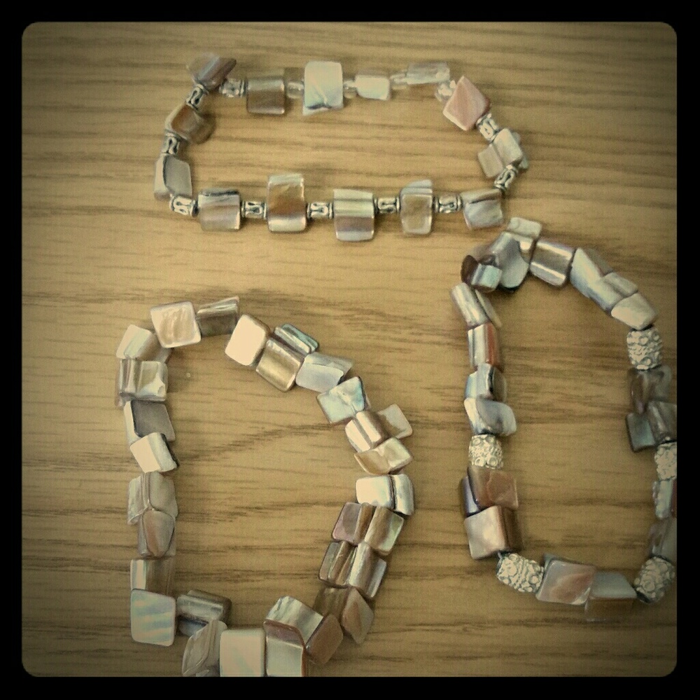 Gold abalone shards beads with metallic beads.