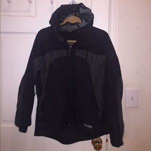 Black M REI rainjacket