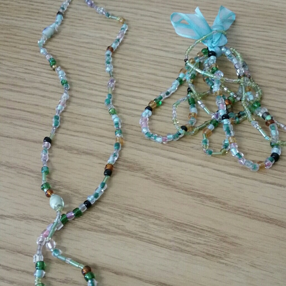 Aquamarine beaded bracelet and necklace set.
