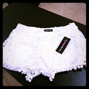 White lace shorts