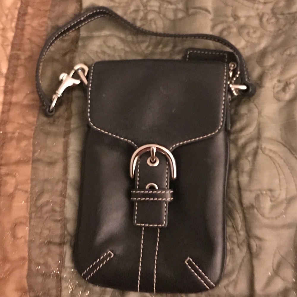 Coach black leather wristlet. GUC