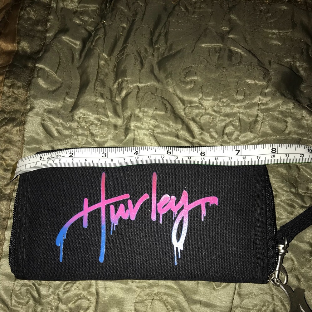 Hurley wristlet wallet. Black. New without tags.