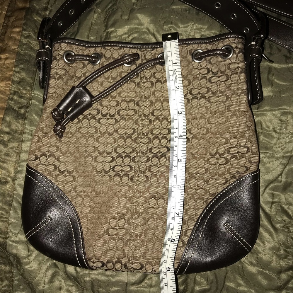Coach brown crossbody drawstring purse.  Used.