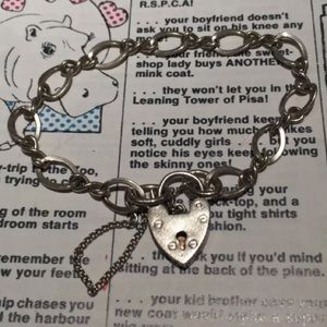 VINTAGE STERLING SILVER CHARM BRACELET