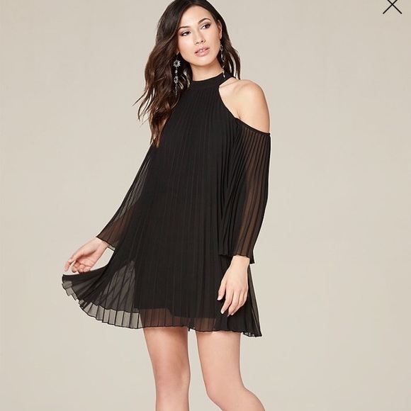 Black bebe dress. Never worn still has tags! - Picture 1 of 3