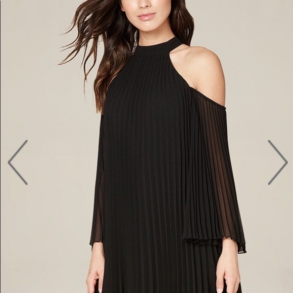 Black bebe dress. Never worn still has tags! - Picture 3 of 3