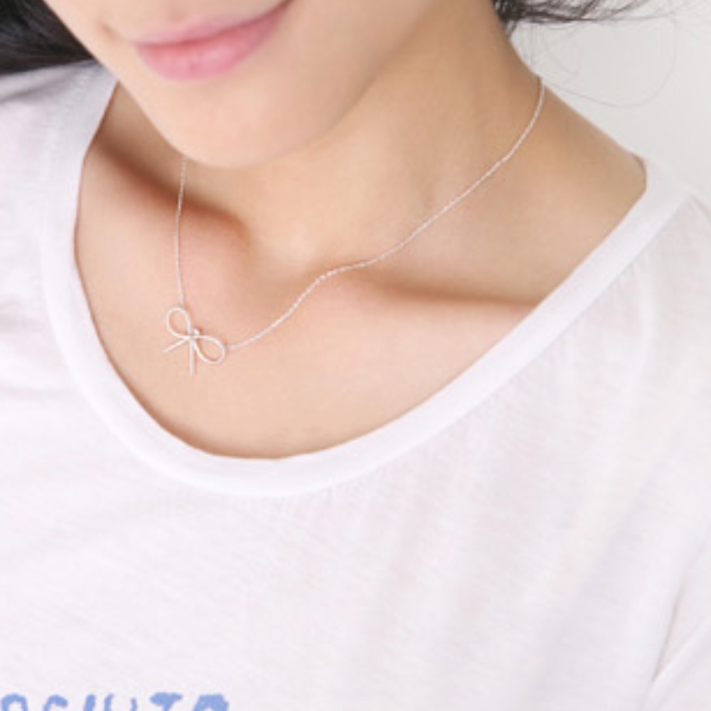 Dainty Silver Bow Necklace - Picture 1 of 6