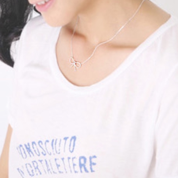 Dainty Silver Bow Necklace - Picture 5 of 6