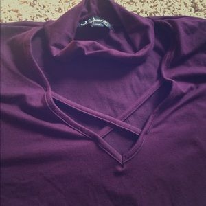 Large lace up v neck. Fits as medium