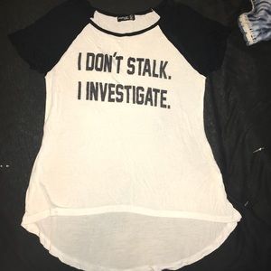 “I don’t stalk I investigate” Graphic T-shirt