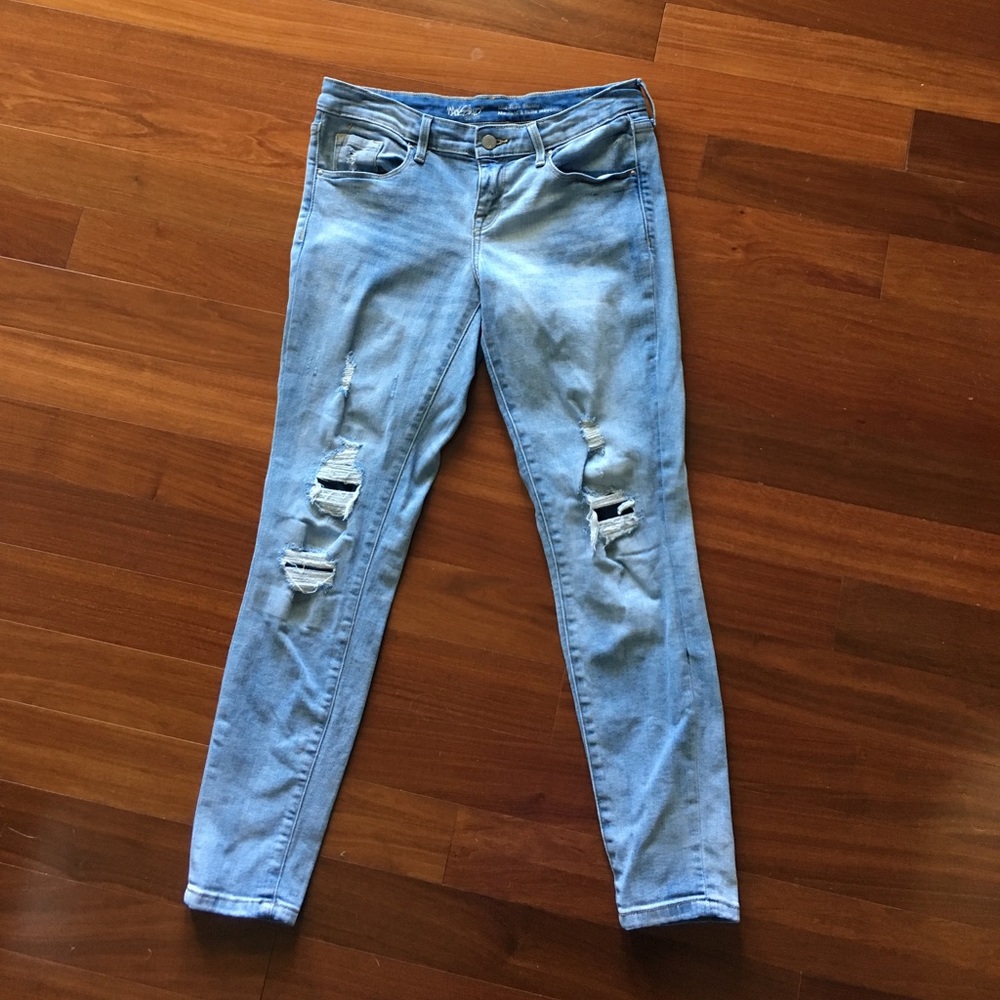 Light wash distressed skinny jeans
