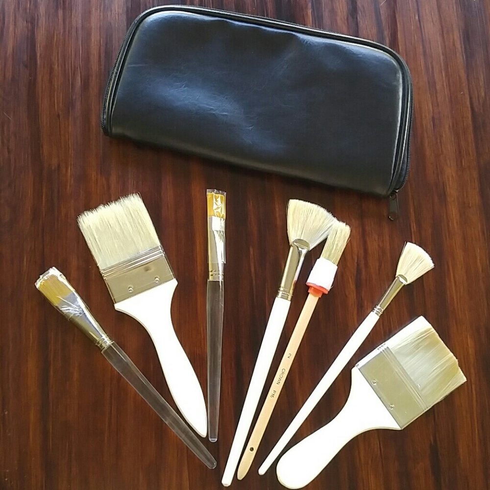 Seven skin care/esthetician brushes w/case