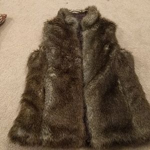 GAP kids reversible fur vest w fleece pockets.