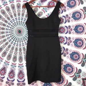 Mini black dress with sheer striped core