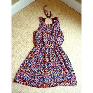 Floral patterned mini dress with tie in back