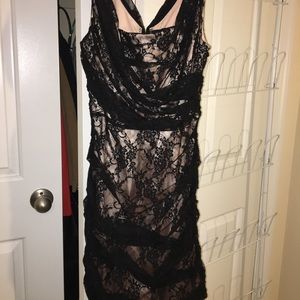 Nude and black lacy dress