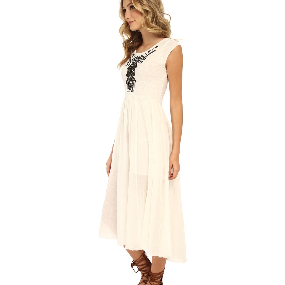 Free people white mid length dress.