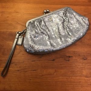 Coach sequin wristlet with satin interior