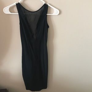 Very mini dress with mesh v cut and low back