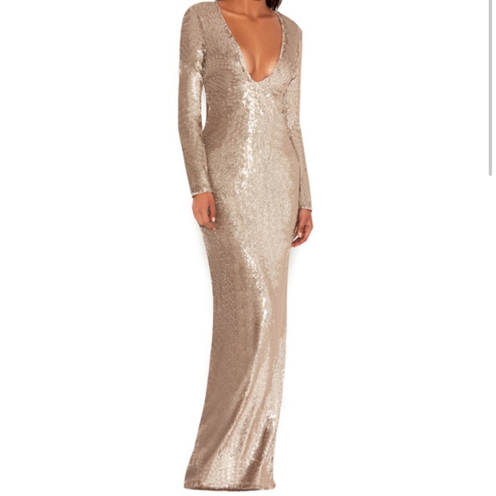 GOLD SEQUINNED PLUNGE NECK MAXI GOWN.