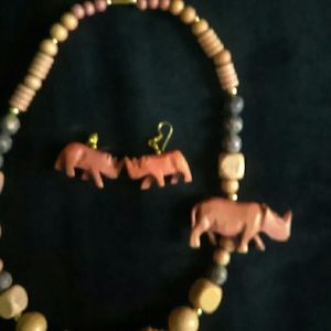 Wooden light pink with purple accents jewelry $$