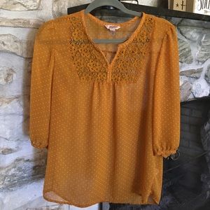 Used. Mustard polka dot Arizona top.