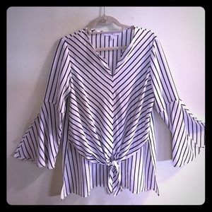 bell sleeved high low blouse