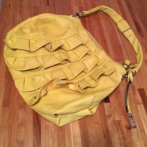 Yellow Elle brand purse with ruffles