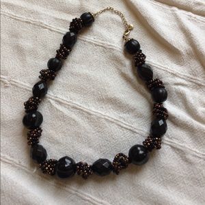 FREE with any purchase. Necklace.