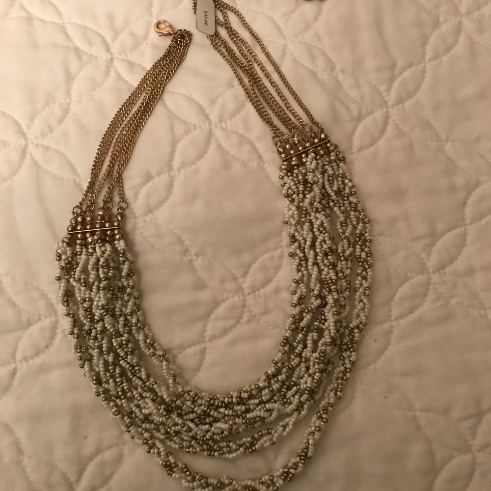 White and gold necklace