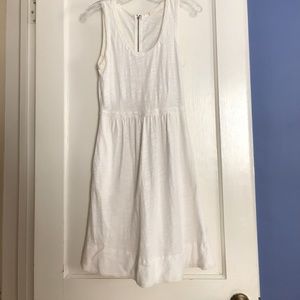 sleeveless white midi dress with pockets