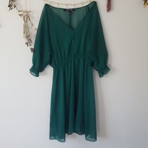 Green slip dress with sheer cover