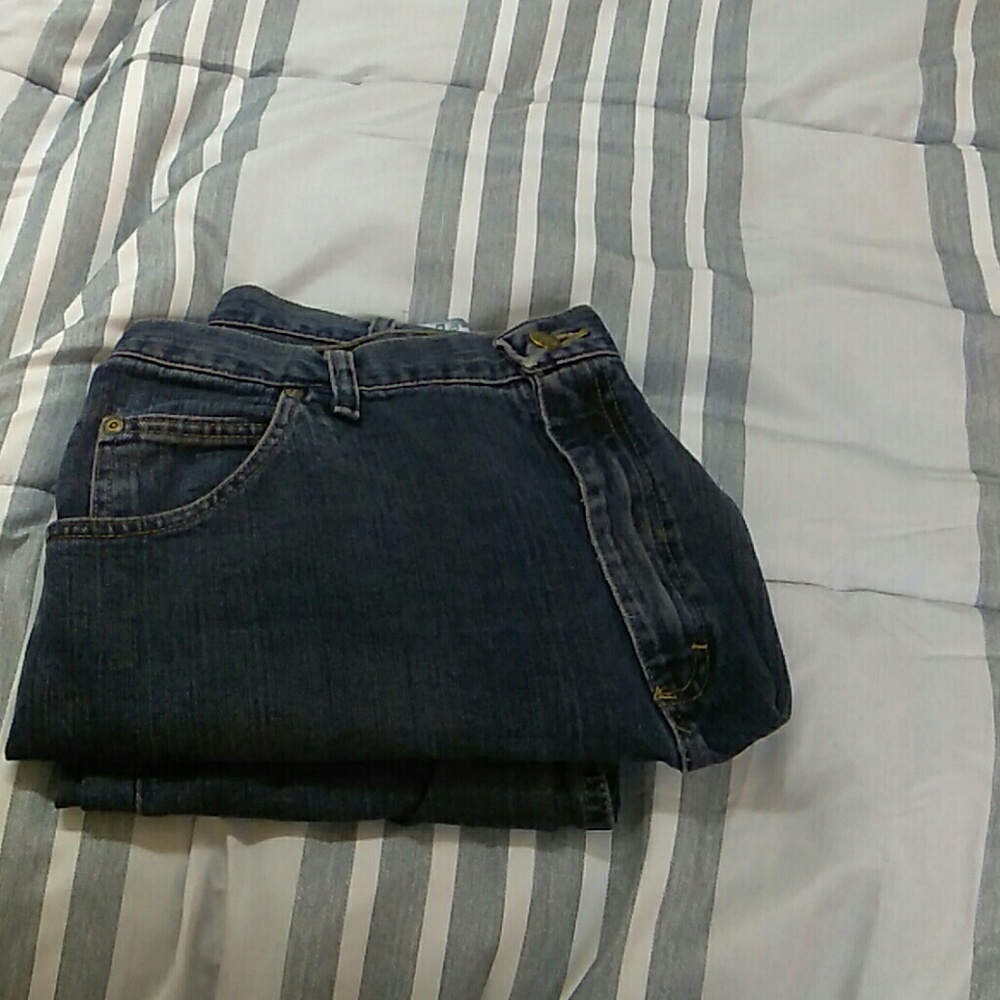 Dark blue jeans hold