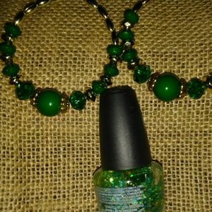 Unique green hoop earrings with matching polish