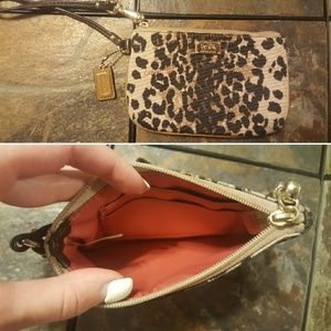Coach ocelot wristlet