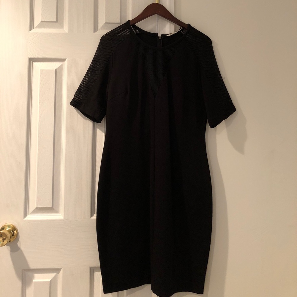Black Trina Turk bodycon dress with sheer details