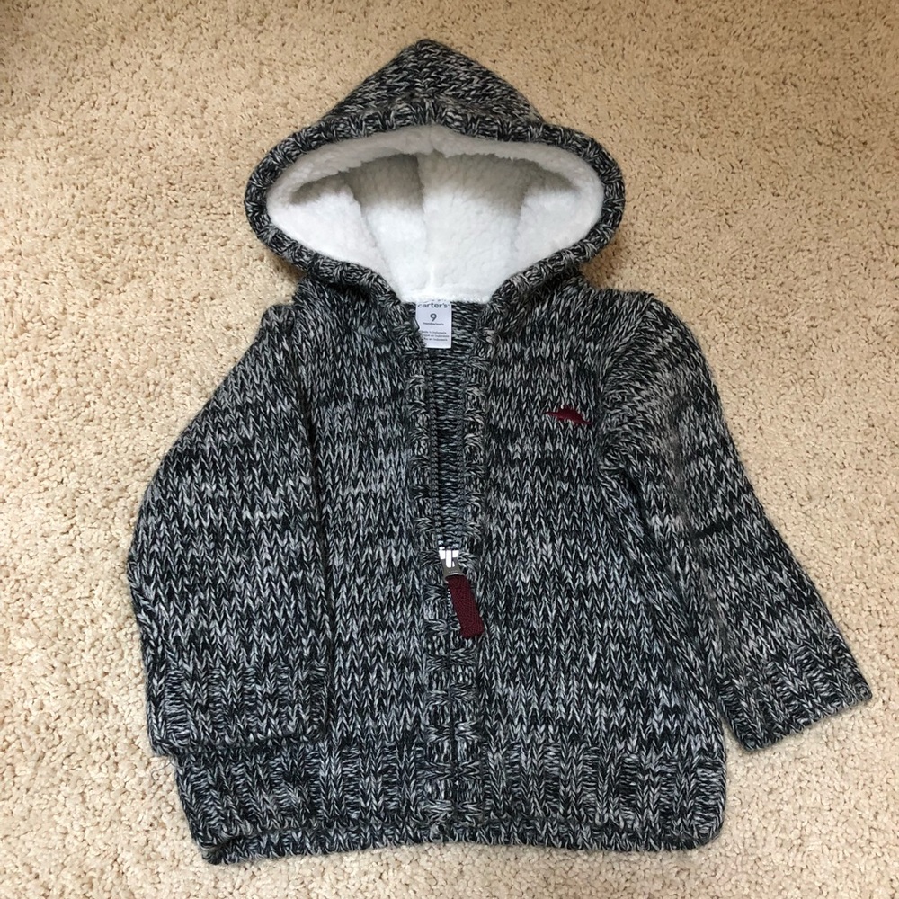 Cozy black sweater with hoodie from Carter’s