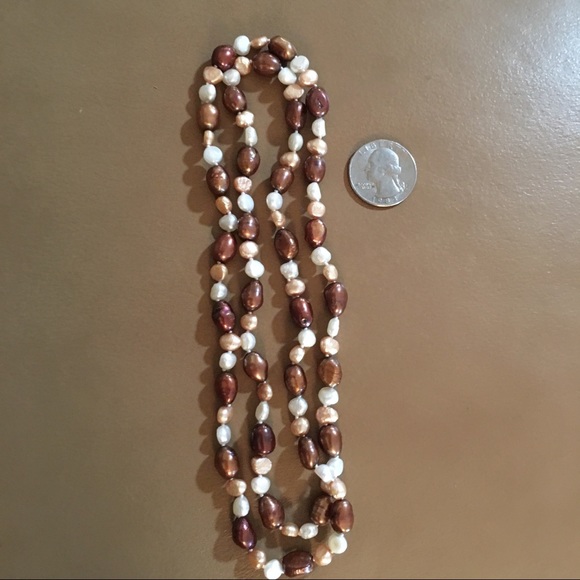 Tan brown and white string of pearls. - Picture 4 of 7