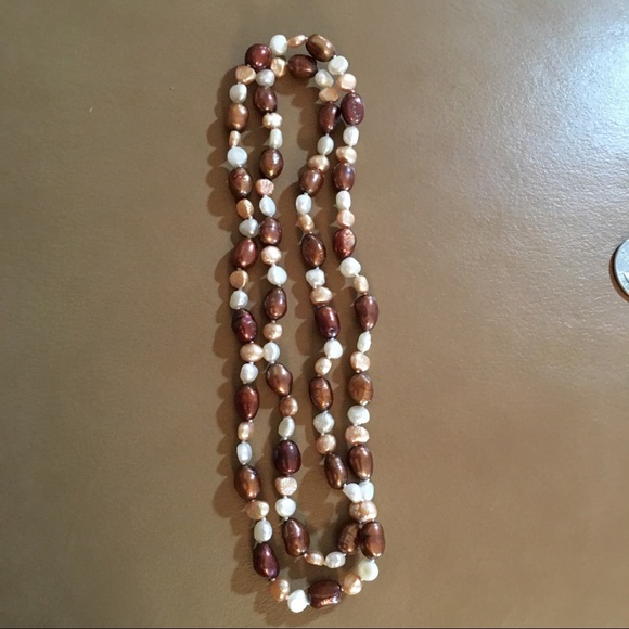 Tan brown and white string of pearls. - Picture 7 of 7