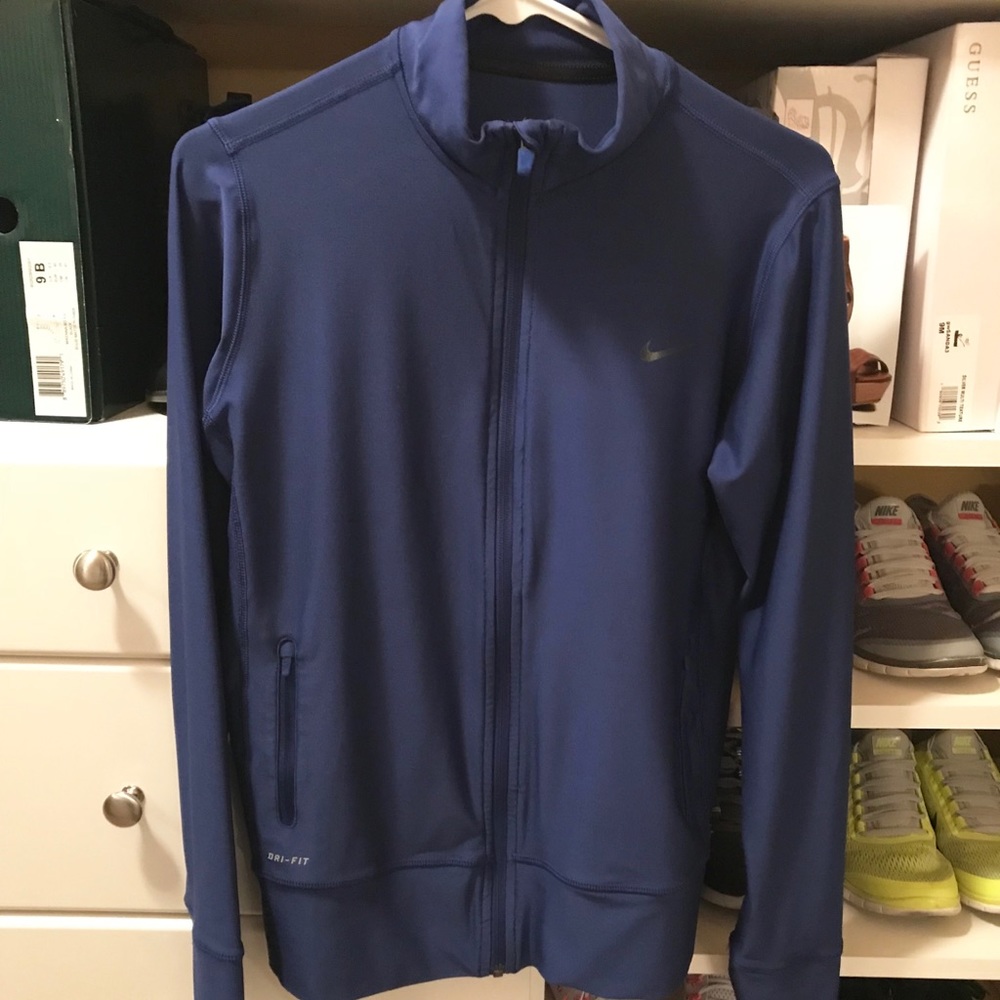 Nike Dri-fit zip up. Size M
