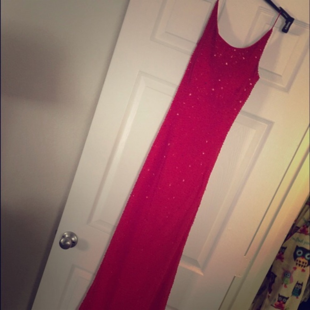 Red open back ball gown