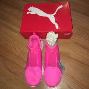 Bright pink puma shoes