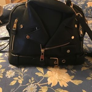 Jacket Purse with lots of zippers