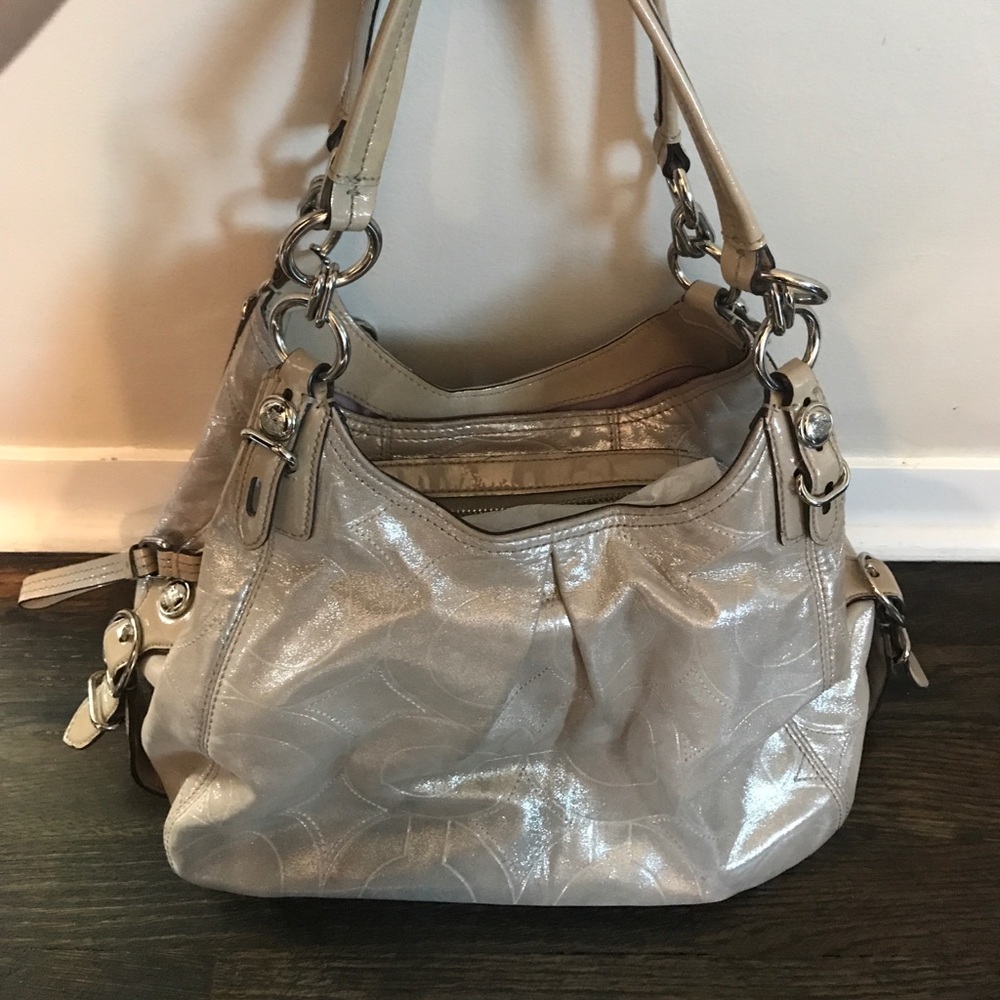 Coach- metallic champagne color-preowned